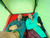 Image of two people laying down inside the tent on the pad.