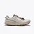 Side view of the Mount to Coast T1 trail running shoe in the Dune colorway, featuring a cream and taupe woven upper, TUNEDFIT dual lacing system, and a Vibram outsole.