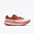 Side view of the Mount to Coast H1 running shoe in the Sedona colorway, featuring a burnt orange and brown mesh upper, dual lacing system, and a red and cream CircleCELL midsole with Vibram outsole.
