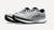 Profile view of both shoes shoes a prominent Vibram logo on the tip of the sole, the white midsole fading to the black and grey upper, and a premium looking synthetic breathable upper.