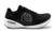 Outside profile of the Phantom shows the robust cushioning of the 35mm stack height. The shoe has a white midsole and black upper with a large Topo logo on the side.