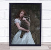 Red haired woman in bride dress holding raccoon Wall Art Print