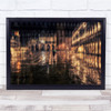 Blurred city view night lights walking in rain Wall Art Print