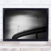 On The Edge Road curve lamppost Black & White Wall Art Print