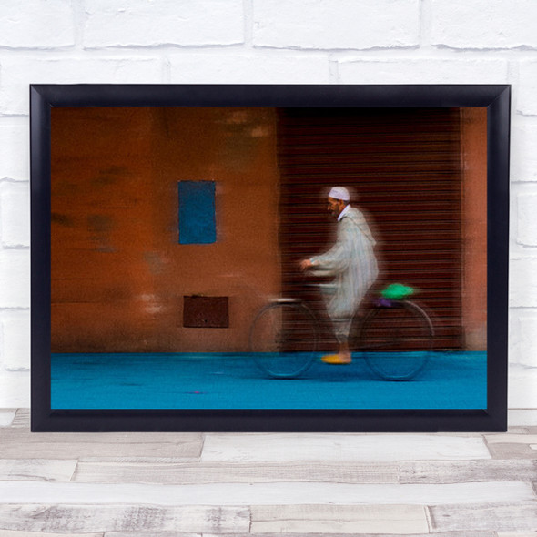 Blurry Motion Man On Bike Orange Building Wall Art Print