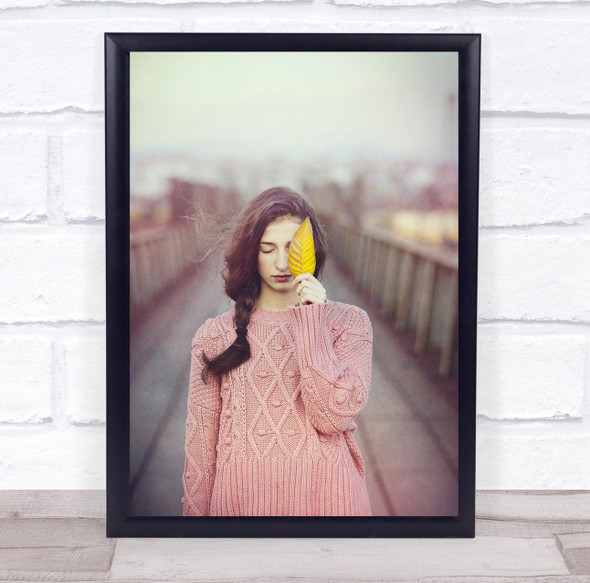 Contemplation woman pink jumper and yellow leaf Wall Art Print