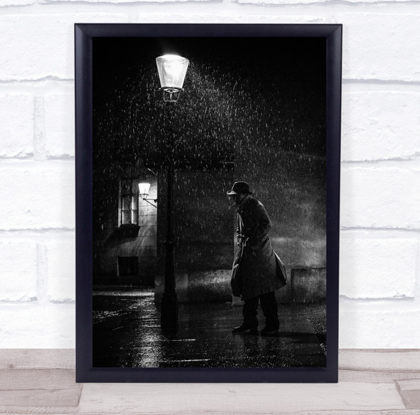Bogart Noir lamppost in the rain man in coat Wall Art Print
