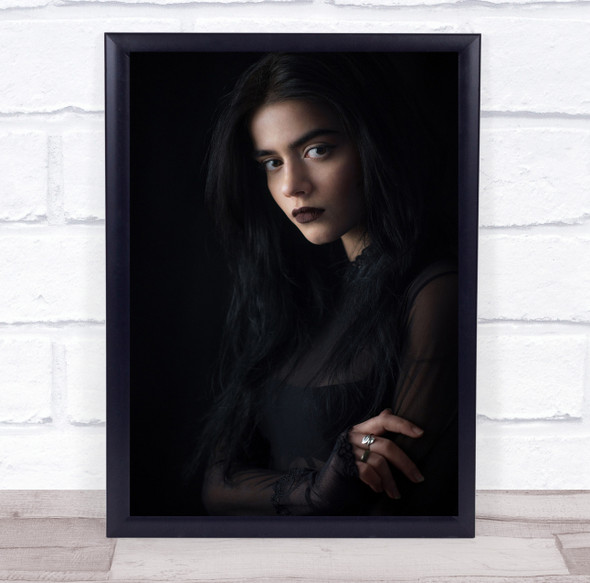 Woman black clothing posing arms crossed Wall Art Print