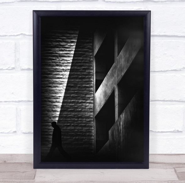 Shadows dark building wall person walk Wall Art Print