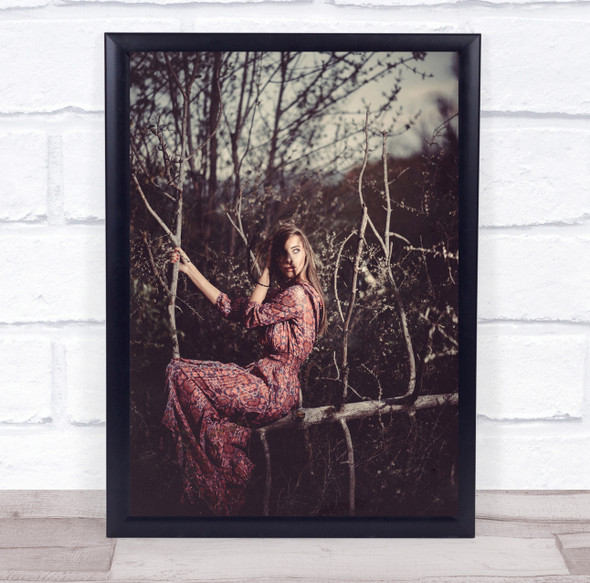 woman in pink dress tree sitting pose Wall Art Print