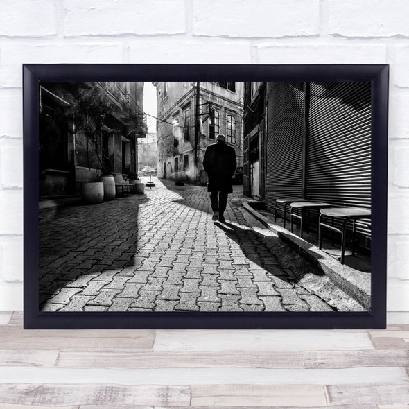 Departure man walking street shadow Wall Art Print