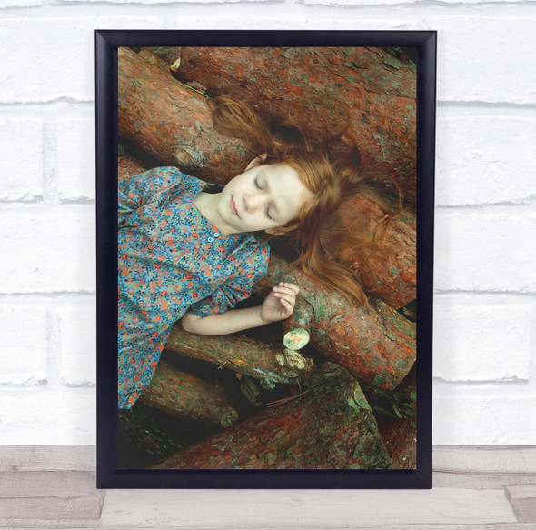 little girl laying logs eyes closed Wall Art Print