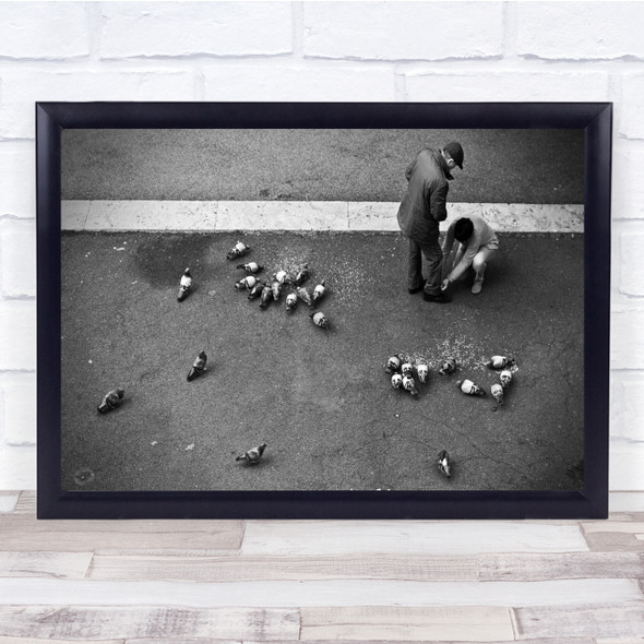 Pigeons feeding Man fixing shoes Wall Art Print