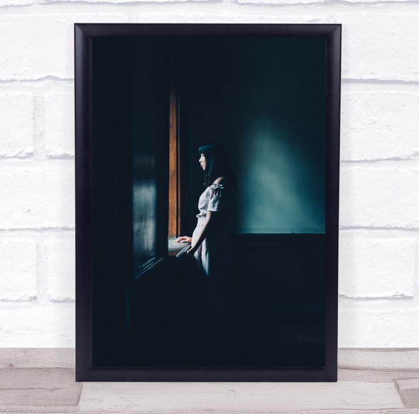 Tomomi woman by window dark room Wall Art Print