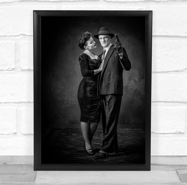 Man in suit and gun woman black dress black and white Wall Art Print