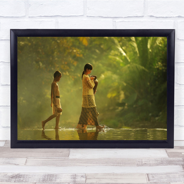 Small Steps Woman and boy walking water reflection Wall Art Print