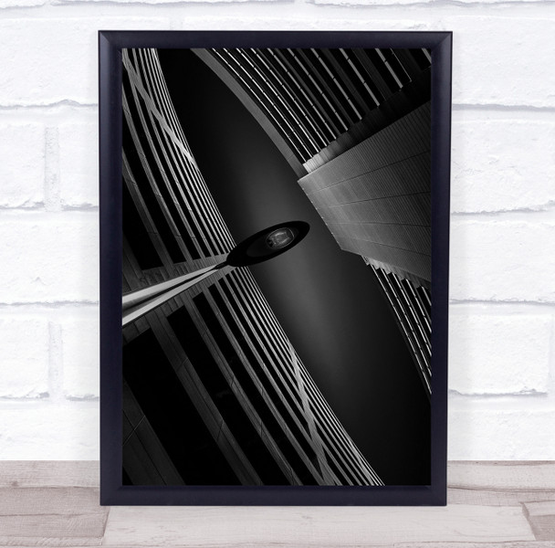 Upshot lamppost buildings curve black and white Wall Art Print