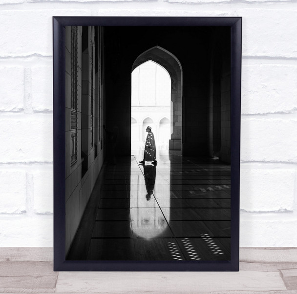 Light man in robes walking arch building Wall Art Print