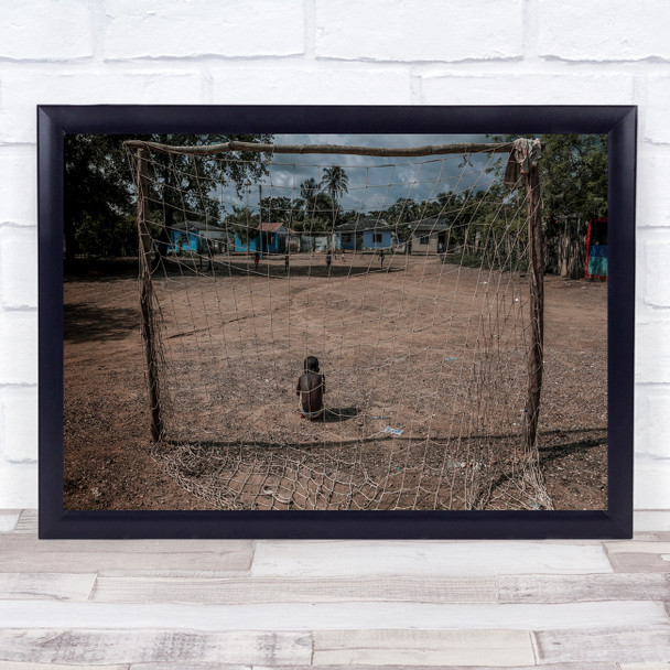 Little boy sitting goal football sport Wall Art Print