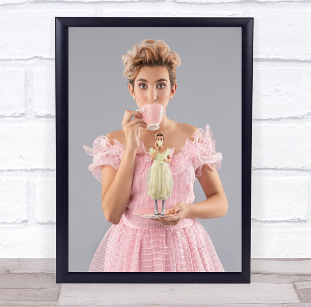 Mini Me pink dressed woman holding yellow dressed woman cup Wall Art Print