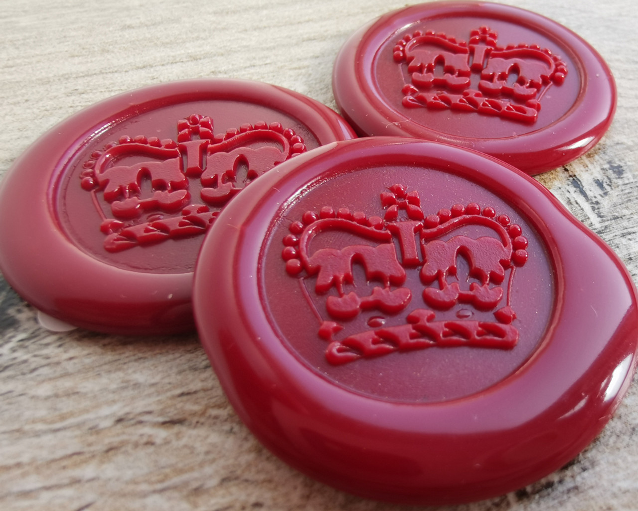 Red wax seal with crown sign Stock Illustration