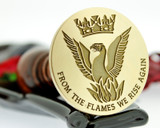 Phoenix design, with additional text (recommend 30mm plus with additional text) size shown 50mm stamp head