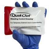 QuikClot® Bleeding Control Dressing, packaged (in hand)