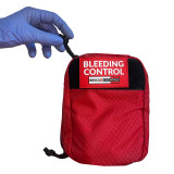 Bleeding Control Station IFAK being upzipped