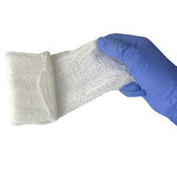 Compressed Gauze, being pulled