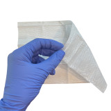 BugX® Towelette, wipe in hand