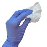 BugX® Towelette, being held