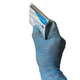 Compact Rescue Blanket, packaged in hand - side