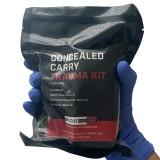 Concealed Carry Trauma Kit, Front being held in hand