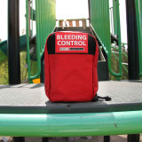 Bleeding Control Station IFAK - Intermediate pouch containing Stop the Bleed products,  on playground equipment