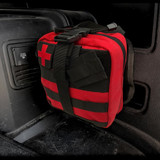 Home Defense Trauma Kit by rescue essentials in red pouch mounted in vehicle