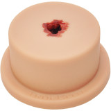 Light  Tone Luna TrueClot Basic Packing Trainer (BPT) wound simulator trainer showing artificial gun shot wound, side view