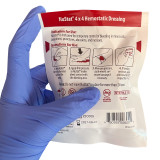 NuStat 4x4 Hemostatic Dressing, Packaged in hand back