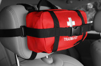 Mutual Aid Trauma MAT Kit mounted on a car headrest by rescue essentials