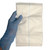 Combine ABD Pad, unfolded in hand