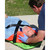 CombiCarrier in use, stabilizing patient's head and neck while and securing patient to board
