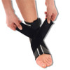 A person adjusting a NeoPhysio Neoprene Ankle Support Brace around their ankle and foot.