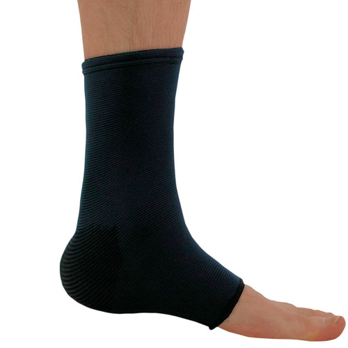 A person's foot with a NeoPhysio Medical Grade Elastic Compression Ankle Support in navy.