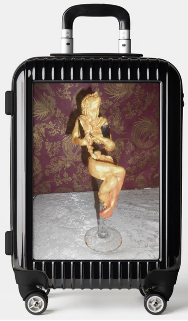 Original Photo of Small Sculpture by New York City, Fine Art Artist, Gaye Elise Beda,. Carry On Luggage www.gayeelisebeda.store Check it out.