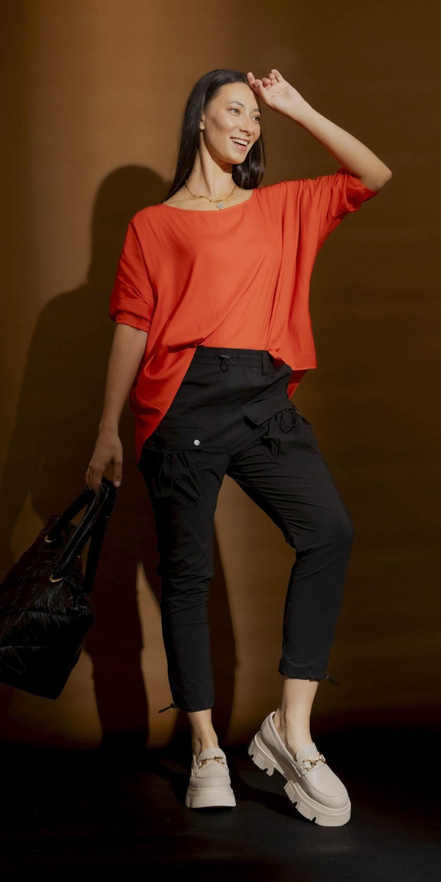 OI - JAN - Black Cargo Pant with Orange Hi-Lo Top