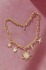 Gold Sun Charm Necklace
