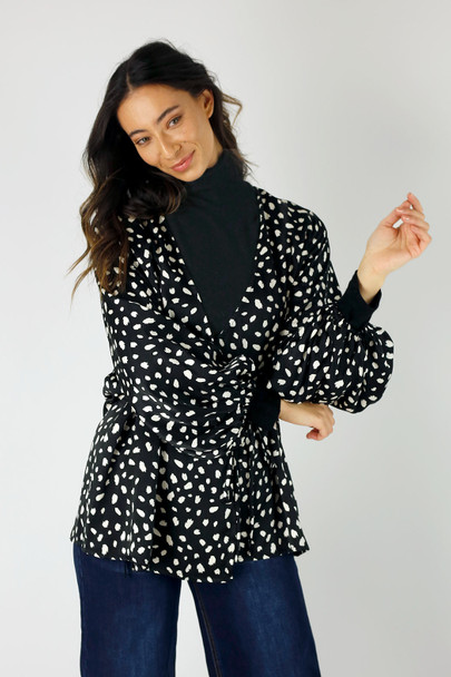 black and white polka dot wrap top