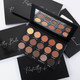 open eye shadow palette with neutral warm shadows