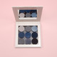 a magnetic palette that holds 9 26mm pan eye shadows in blues and grays.