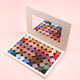 an extra large magnetic palette holding 54 colorful eye shadows