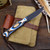Custom Small Game -  Magnacut - Black Cerakote - Black / White / Blue Gwood Handle